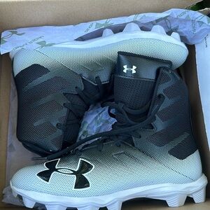 Brand new! Under Armour football cleats. Mens size 7.
